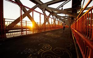 Jogging on the iron bridge wallpaper thumb