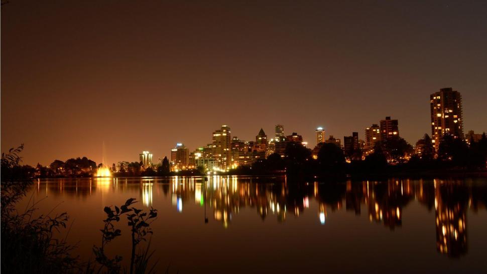 Evening Lights Of Downtown Vancouver wallpaper,reflection HD wallpaper,lights HD wallpaper,evening HD wallpaper,nature HD wallpaper,cityscapes HD wallpaper,vancouver HD wallpaper,night HD wallpaper,nature & landscapes HD wallpaper,1920x1080 wallpaper