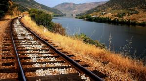 Train Tracks Along A River Valley wallpaper thumb