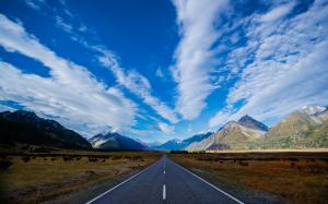 New Zealand, highway, road, mountains, blue sky, white clouds wallpaper thumb