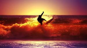 Surfer At Sunset wallpaper thumb