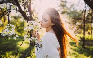 Girl hair in the wind, sun rays, spring, white flowers wallpaper thumb