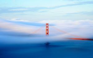 Golden Gate Bridge covered in fog wallpaper thumb