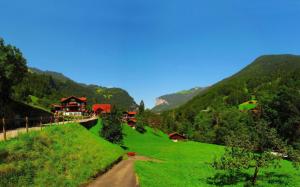 Switzerland village in the mountains wallpaper thumb