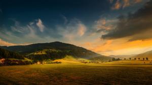 Countryside, mountain, forest, houses, farmland, sunset, clouds wallpaper thumb