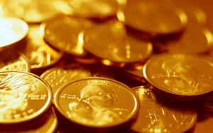 Gold coins close-up, currency wallpaper thumb