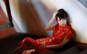 Beautiful red cheongsam girl in the room wallpaper thumb