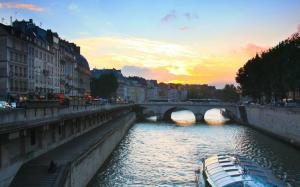 Seine river paris at sunset wallpaper thumb