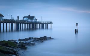 Pier over foggy water wallpaper thumb