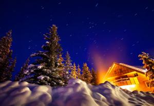 Lighted Winter Cabin wallpaper thumb