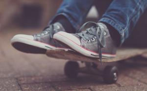 Sneakers on a skateboard wallpaper thumb