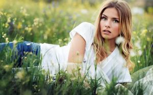 Blonde girl lying the grass, summer wallpaper thumb