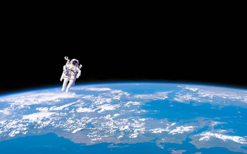 Astronaut in Space wallpaper,earth HD wallpaper,fly HD wallpaper,cosmos HD wallpaper,blue HD wallpaper,2560x1600 wallpaper