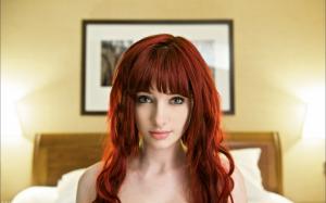 Beautiful red hair girl in bedroom wallpaper thumb