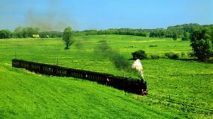 Old Steam Train Through Grass Fields wallpaper thumb