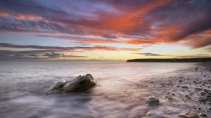 Ocean Sunset Beach Timelapse Rocks Stones Clouds HD wallpaper thumb