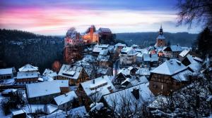 Castle On A Cliff Above A Town In Winter wallpaper thumb