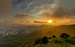 Buildings Skyscrapers Sunset Sunlight Fog Mist Clouds Grass HD wallpaper thumb