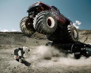 Monster Truck Jump Stop Action HD wallpaper thumb