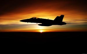 Fighter flying in dusk sky wallpaper thumb
