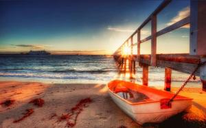 Little Row Boat Tied To Sea Pier At Sunrise Hdr wallpaper thumb
