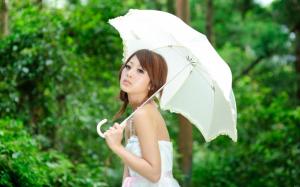 Bride with an umbrella wallpaper thumb