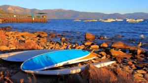 Surfboards On A Rocky Shore wallpaper thumb
