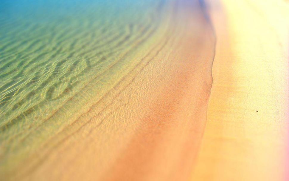 Ocean Ripples Over Sy Beach wallpaper,beaches HD wallpaper,waves HD wallpaper,colorful HD wallpaper,ocean HD wallpaper,sand HD wallpaper,ripples HD wallpaper,nature & landscapes HD wallpaper,1920x1200 wallpaper