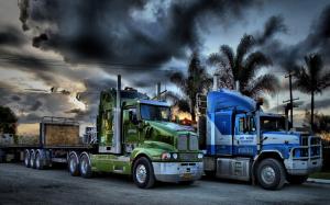Two Trucks Parked Under Stormy Clouds Hdr wallpaper thumb