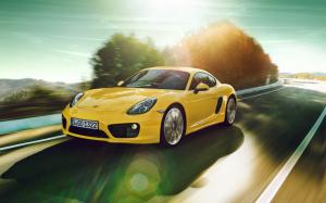Porsche Cayman yellow car speed wallpaper thumb