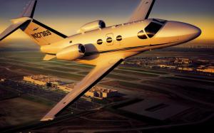 Cessna Citation Mustang over Airport wallpaper thumb