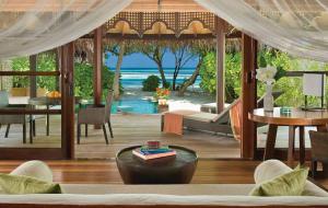 Beach Bungalow View Out In The Maldives wallpaper thumb