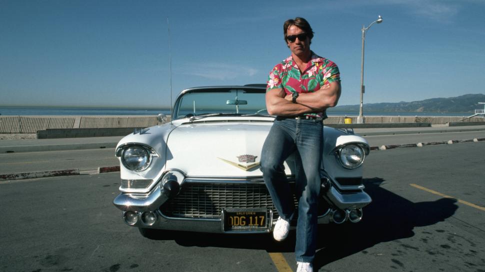 Cadillac and Arnold Schwarzenegger wallpaper,arnold schwarzenegger HD wallpaper,terminator HD wallpaper,hollywood HD wallpaper,2560x1440 wallpaper