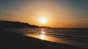 Sunset Sunlight Beach Ocean HD wallpaper thumb