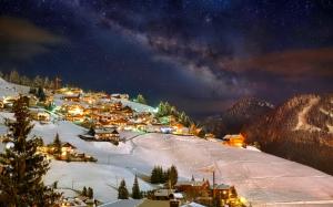 Winter, mountains, sky, night, stars, houses, lights wallpaper thumb