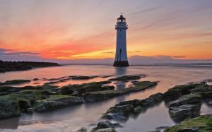 Sea, coast, rocks, sunset, lighthouse, red sky wallpaper thumb