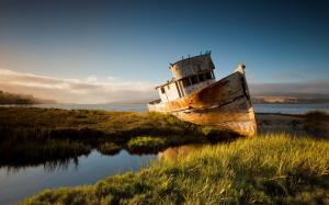 A broken ship, sunset, river, grass wallpaper thumb