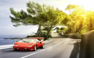 Lamborghini red supercar front view, sun glare wallpaper thumb